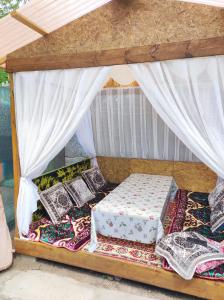 Postel nebo postele na pokoji v ubytování Olga Guest House