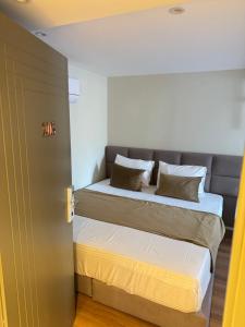 Postel nebo postele na pokoji v ubytování Vion Hotel