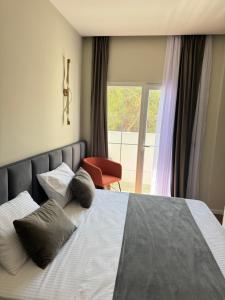 Postel nebo postele na pokoji v ubytování Vion Hotel