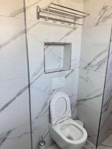 Koupelna v ubytování Vion Hotel
