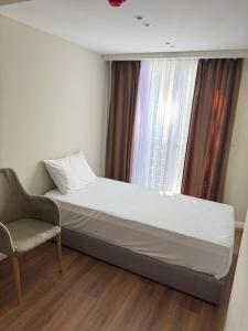 Postel nebo postele na pokoji v ubytování Vion Hotel