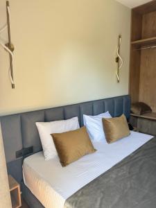 Postel nebo postele na pokoji v ubytování Vion Hotel
