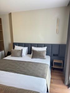 Postel nebo postele na pokoji v ubytování Vion Hotel