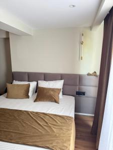 Postel nebo postele na pokoji v ubytování Vion Hotel