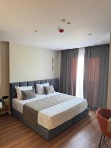 Postel nebo postele na pokoji v ubytování Vion Hotel