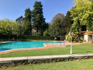 Basen w obiekcie RESIDENCIAL MONDARIZ BALNEARIO 123 lub w pobliżu