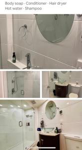 a bathroom with a shower and a sink and a mirror at Cliff House in West Vancouver