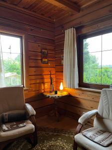 Posezení v ubytování Senovinis medinis namas - Gintaras