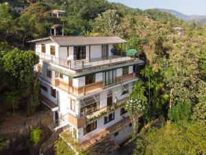 an aerial view of a house on a hill at HELFAROAN Spacious, Superb panoramic view! in Kandy