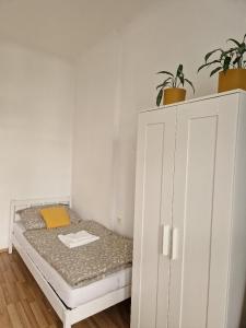 Ένα ή περισσότερα κρεβάτια σε δωμάτιο στο Apartman Sam