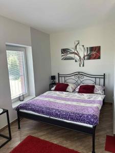 Postel nebo postele na pokoji v ubytování Apartmány Na Rozcestí