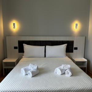 Postel nebo postele na pokoji v ubytování Hotel Garden + 10 fotografií