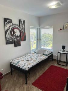 Postel nebo postele na pokoji v ubytování Apartmány Na Rozcestí