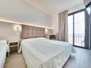 Postel nebo postele na pokoji v ubytování Hotel Villa Sole Resort