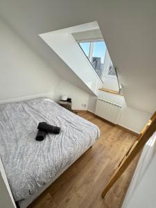 Posteľ alebo postele v izbe v ubytovaní Superbe Logement Vue Cathédrale