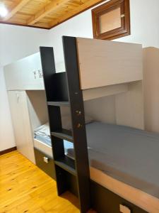 an empty closet with a black and wooden cabinet at casa en Cedeira in Cedeira