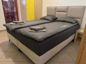 Ένα ή περισσότερα κρεβάτια σε δωμάτιο στο Tre terre apartment 2