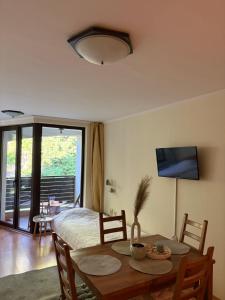 TV a/nebo společenská místnost v ubytování Николай Желев-Първи ЕООД