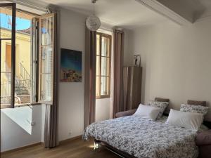 Posteľ alebo postele v izbe v ubytovaní Suquet 5 mins à pied du palais