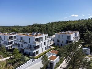 an aerial view of two white apartment buildings at Leśne spa przy Sopocie in Gdynia