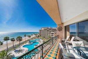 a view of the beach from the balcony of a resort at Sonoran Spa 2BR 2BA Sleeps 8 6th Floor- E607 in Campo del Medio