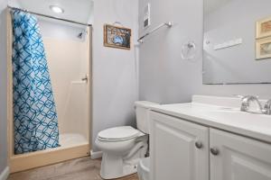 Koupelna v ubytování Beach Place + 11 fotografií