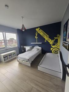 Postel nebo postele na pokoji v ubytování Tomorrowland Crib in de buurt van Boom