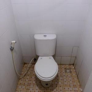 Ένα μπάνιο στο Suitesmetro Apartment