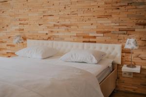 Postel nebo postele na pokoji v ubytování Gîte champêtre Al Wèrihè