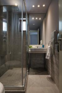 Koupelna v ubytování Dimitra Boutique Hotel + 37 fotografií