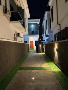 a hallway of a house at night with lights at Four bedroom Luxury house Lekki in Lekki