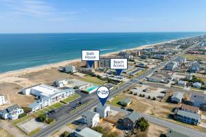 an aerial view of a city with a road and the ocean at Coasties Ocean Breeze in Kill Devil Hills +44 photos