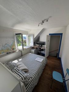 Ένα ή περισσότερα κρεβάτια σε δωμάτιο στο Maison calme bord de mer 150m +15 φωτογραφίες