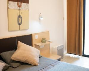 Ένα ή περισσότερα κρεβάτια σε δωμάτιο στο Sea Front 2 bedroom apartment