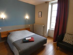Postel nebo postele na pokoji v ubytování Gîte la loutière