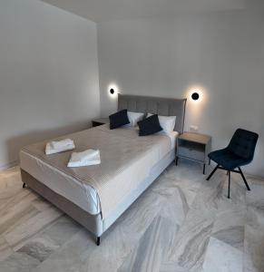 Ліжко або ліжка в номері Palma Village by Greek Pride Hotels