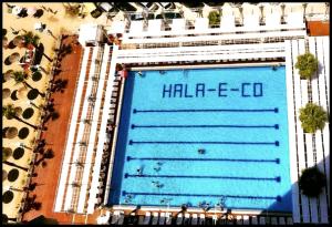 an overhead view of a large swimming pool at Blue Apartment Kamelia in Durrës