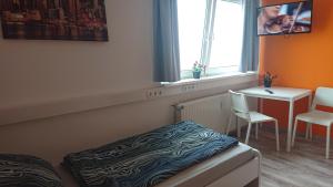 Gallery image of Zweibettzimmer mit Gemeinschaftsküche und Gemeinschaftsbädern in Hohenstein-Ernstthal