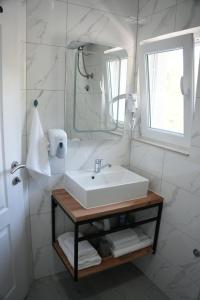 Ένα μπάνιο στο Studio apartman Ivica