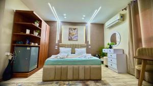 Postel nebo postele na pokoji v ubytování Casablanca Hotel + 13 fotografií