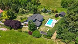 an aerial view of a house with a swimming pool at Hausta House in Pregrada