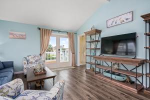 Μια τηλεόραση ή/και κέντρο ψυχαγωγίας στο Bearfoot Bungalow