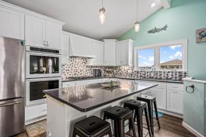 Η κουζίνα ή μικρή κουζίνα στο Bearfoot Bungalow