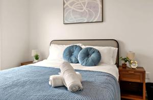 Ένα ή περισσότερα κρεβάτια σε δωμάτιο στο Stylish 1Bd In Heart of Minneapolis, Minutes From Minneapolis Convention Center & US Bank Arena