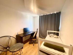 Postel nebo postele na pokoji v ubytování Appartement lumineux et convivial à partager