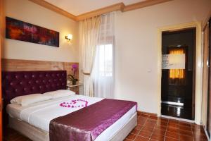 Postel nebo postele na pokoji v ubytování Hotel Konak Su + 37 fotografií