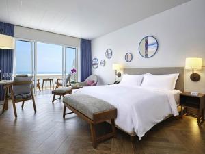 Mercure Vung Tau Resort客房内的一张或多张床位