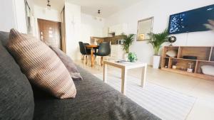 Telewizja i/lub zestaw kina domowego w obiekcie Apartament Słoneczny 10