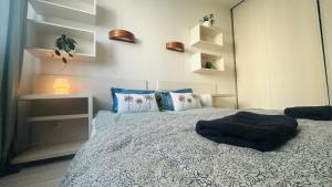 Łóżko lub łóżka w pokoju w obiekcie Apartament Słoneczny 10