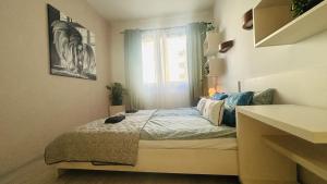Łóżko lub łóżka w pokoju w obiekcie Apartament Słoneczny 10